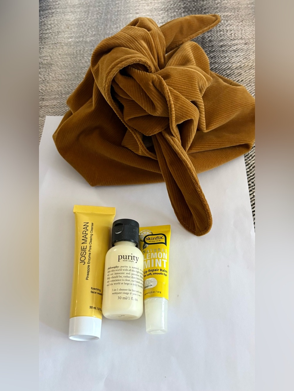 3 skincare essentials & cloth larger bag to hold makeup